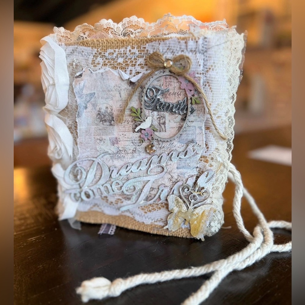 Handcrafted, sewn scrapbook in “Dreams Come True” theme